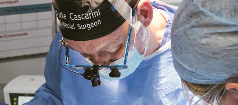 Oral and maxillofacial surgeon Mr Luke Cascarini operating