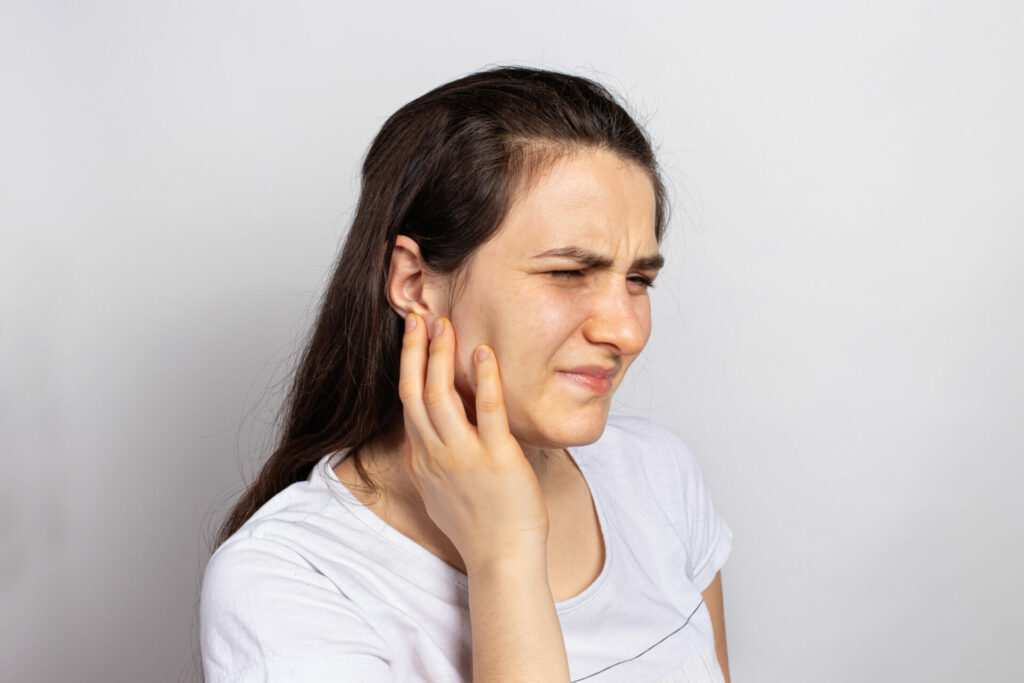 woman with ear pain